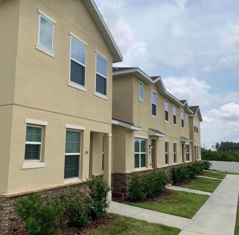 Photo of 112 Holly Village Drive, Davenport, FL 33837 (MLS # O6402277)