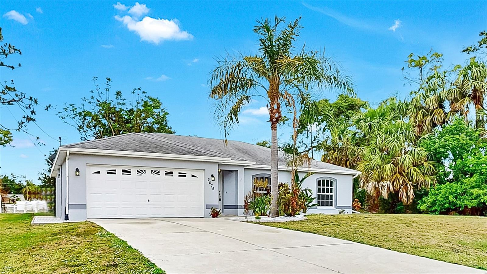 Welcome to 2675 Cherokee St, North Port, FL – a beautifully updated home offering privacy, space, and modern upgrades in one of Southwest Florida’s sought-after locations. This 3-bedroom, 2-bath home features an open floor plan with luxury vinyl plank flooring throughout, stone countertops, and vaulted ceilings that create a bright and airy living space. Enjoy the ideal split-bedroom floor plan that provides comfort and separation for family or guests. Step outside to your screened-in patio and take in the tranquil view – the spacious backyard backs up to a peaceful canal, with no neighbors on one side for added privacy. The yard is beautifully enhanced with fresh landscaping and has plenty of space for entertaining, gardening, or even a future pool. No HOA or CDD fees! You're minutes from Warm Mineral Springs, Myakkahatchee Creek Environmental Park, the North Port Aquatic Center, and just a short drive to Venice Beach. Whether you're looking for a primary residence, seasonal home, or investment property, this North Port gem is move-in ready and waiting for you. Schedule your showing today!