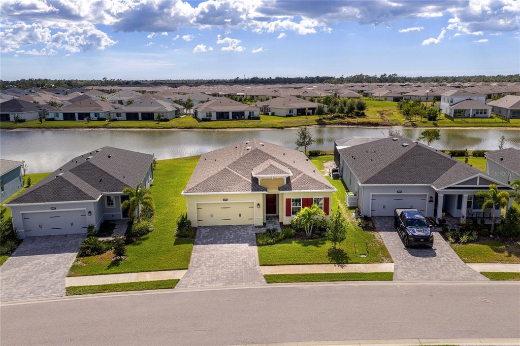 Photo of 16371 S Port Harbor Boulevard, Port Charlotte, FL 33953 (MLS # A4668363)