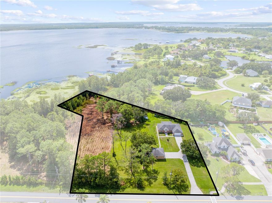 RARE LAKEFRONT OPPORTUNITY!
Welcome to your dream retreat — 2.6 acres of serene lakefront living with 151 feet of direct water frontage on Lake Lizzie, part of the Alligator Chain of Lakes!

This well-built brick home combines comfort, space, and natural beauty. Inside, you’ll find a spacious kitchen that seamlessly opens to the main living area, plus a Florida Room offering panoramic views and endless natural light. With 3 bedrooms featuring walk-in closets, 2 full bathrooms, a laundry room, and an attached garage, this home is designed for both everyday living and entertaining.

Need extra space? You’ll love the detached double bay garage—ideal for boat storage, a workshop, or extra covered parking.

Step outside and right into breathtaking lake views from your back porch, where you’ll experience Florida’s stunning sunrises and sunsets right from your own backyard. For boating and fishing enthusiasts, Trout Lake Boat Ramp is just down the road, offering convenient access to the water.

Whether you're looking to unwind, explore, or entertain, this unique property gives you the rare chance to create your very own Florida lakefront oasis.