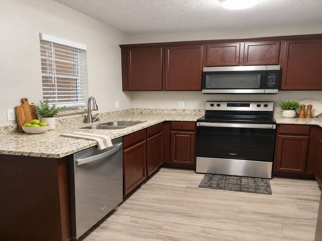 Photo of 239 Castlekeeper Pl, Valrico, FL 33594 (MLS # TB8553468)