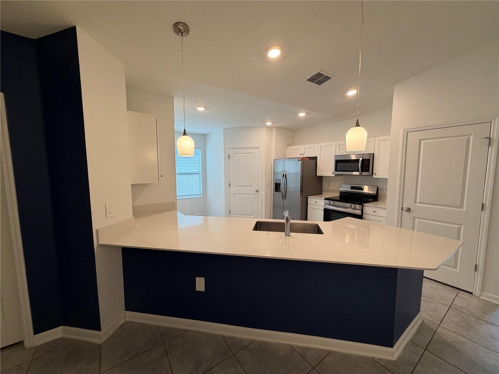 Photo of 225 Lawson Avenue, Haines City, FL 33844 (MLS # S5155257)