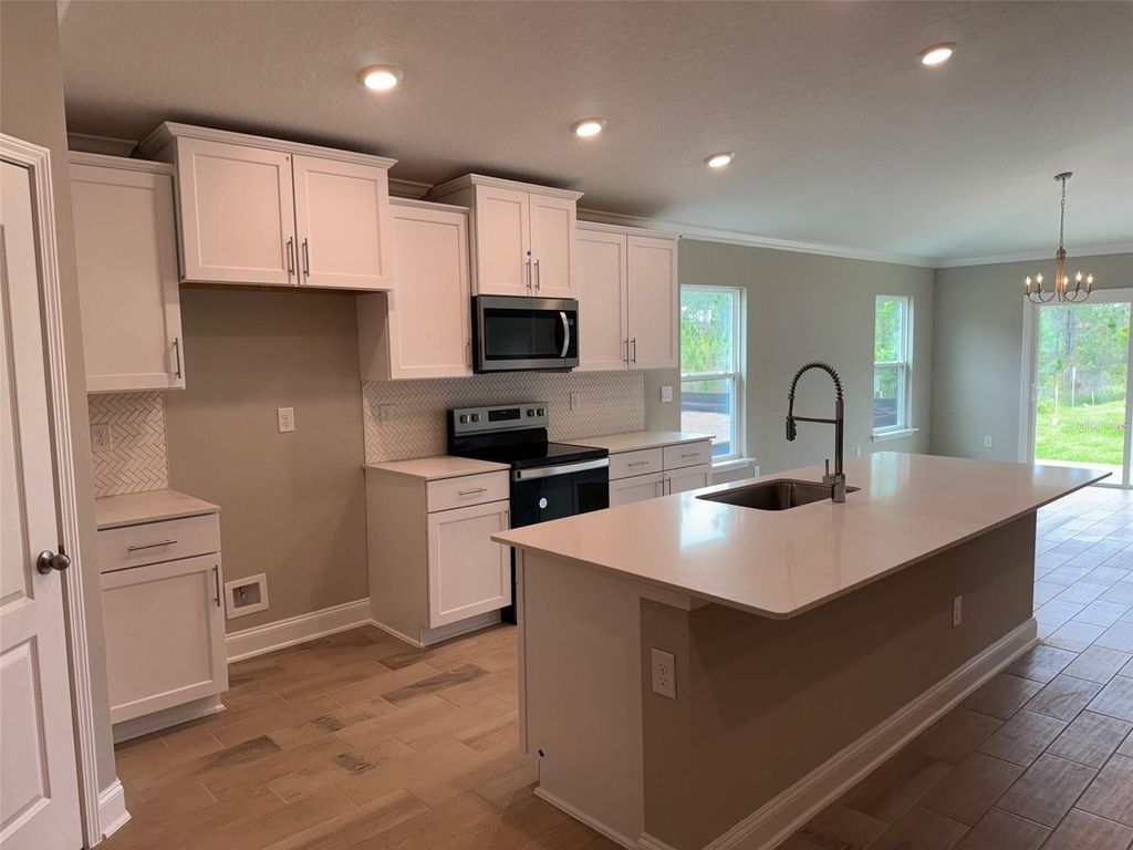 Photo of 62 Hulett Woods Road, Palm Coast, FL 32137 (MLS # FC298197)
