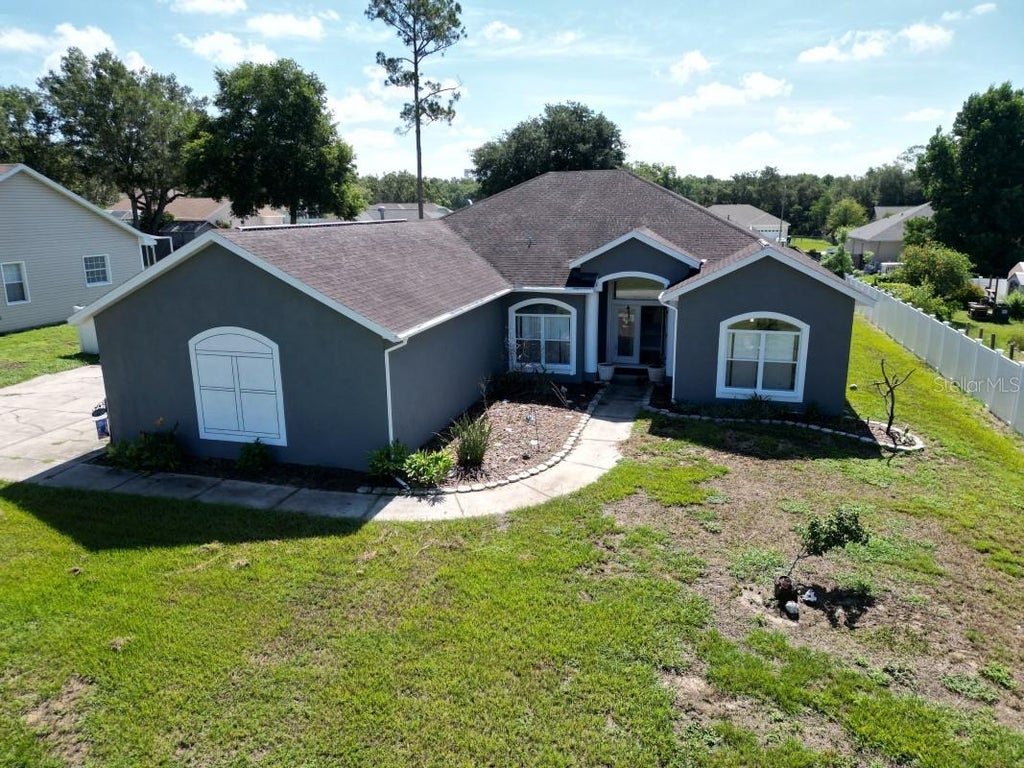 Photo of 12106 Palm Street, San Antonio, FL 33576 (MLS # TB8534007)