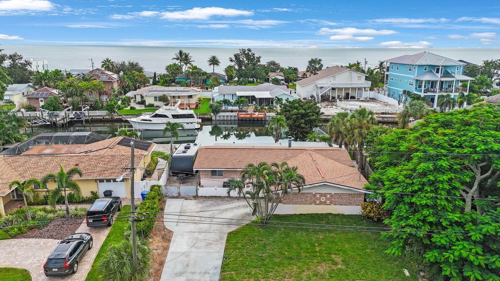 Literally Minutes from open water on a deep water canal with no bridges between you and wide open water of tampa bay. deep enough for sailboats, or large yachts. This 3/2/2 home has a very nice open layout, eat in kitchen opens to a living room. Primary bedroom has it's own ensuite. large screened patio overlooks a wide canal, with beautiful views, perfect for entertaining. This incredibly priced home is located in coquina key, just minutes from downtown st pete, beaches, shopping and all that st pete has to offer. coquina keys waterfront park has has tennis and pickleball courts, soccer fields, basketball courts, a wonderful jogging trail, and soccer fields. this home had no flooding, has a newer ac (2024). this home is a boaters dream. better get here quick