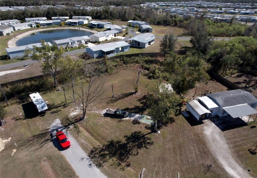 Large lot with existing utility connections already in place, saving time and development costs. The previous home has been removed, offering a blank canvas to build your permanent residence or seasonal retreat, with no HOA restrictions. Conveniently located near I-75, shopping centers, restaurants, golf courses, medical facilities, and the beautiful Gulf beaches. Just minutes from a public boat ramp with easy access to the Peace River, perfect for boating and fishing enthusiasts. Don’t miss this opportunity to own a piece of Florida paradise.