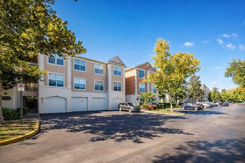 Photo of 12849 Madison Pointe Circle #307, Orlando, FL 32821 (MLS # TB8445013)