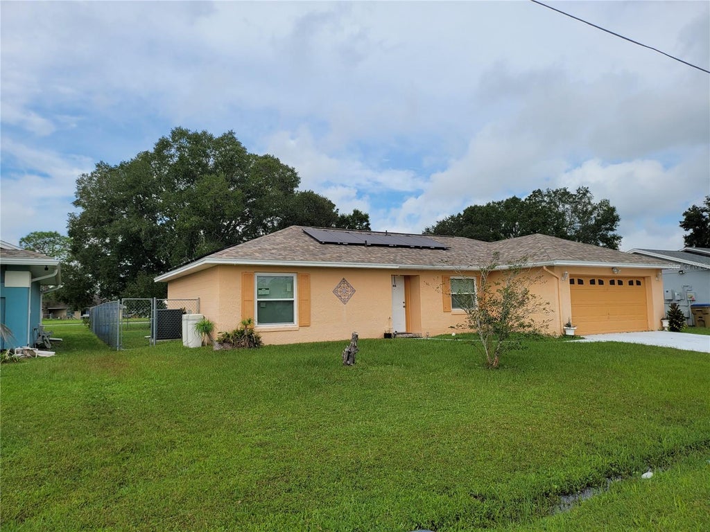Photo of 910 San Carlos Way, Kissimmee, FL 34758 (MLS # O6453398)