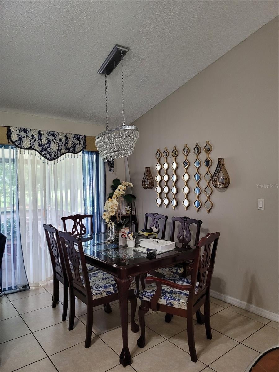 Photo of 910 San Carlos Way, Kissimmee, FL 34758 (MLS # O6453398)