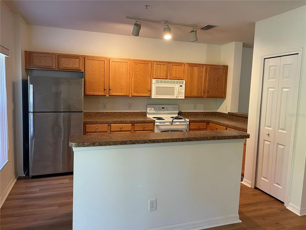 Photo of 9906 Tivoli Villa Drive, Orlando, FL 32829 (MLS # O6381180)