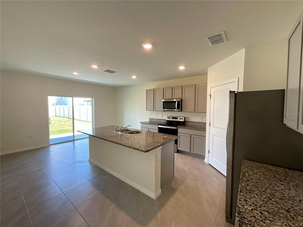Photo of 33409 Field Maple Loop, Wesley Chapel, FL 33545 (MLS # TB8507104)