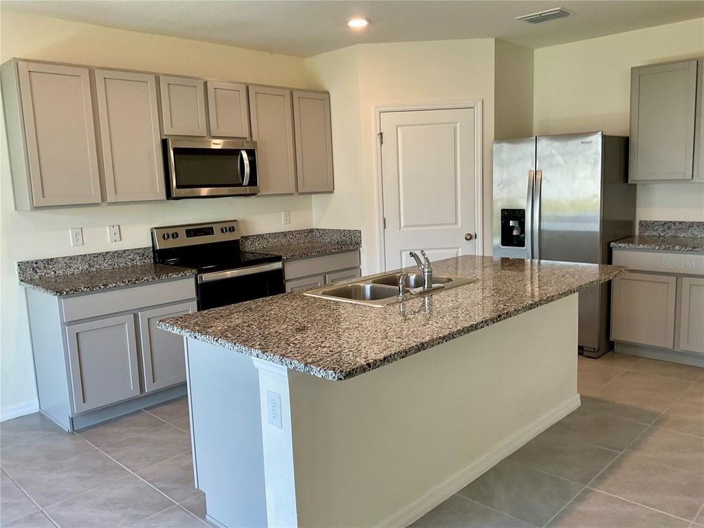 Photo of 33409 Field Maple Loop, Wesley Chapel, FL 33545 (MLS # TB8507104)