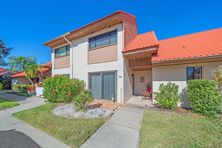 Welcome to your new retreat in this sought-after community where lake views and wildlife sightings become part of your daily routine. This charming two-bedroom, two-and-a-half-bathroom townhouse offers nearly 1,500 square feet of thoughtfully designed living space, ready for you to simply unpack and start enjoying life. Upstairs, you'll discover two ensuite bedrooms, each featuring queen beds and walk-in showers. The primary bedroom is bathed in natural light from sliding glass doors that open to a generous sunroom overlooking lush greenery and a peaceful water canal. It's the kind of view that makes morning coffee feel like a vacation. The main level welcomes you with a comfortable living room that flows seamlessly to a screened lanai, perfect for entertaining or simply watching the Florida sunsets. The kitchen boasts granite countertops, genuine wood cabinetry, and a convenient pass-through bar that keeps conversation flowing while you cook. A separate dining room drenched in natural light creates an inviting space for memorable meals with friends and family. Practical touches abound, including an inside laundry room and dedicated storage space. Beyond your doorstep, the community delivers impressive scenery. Nestled at the end of a scenic winding road, this charming turnkey furnished townhouse invites you to experience the perfect blend of comfort and natural beauty. Wake up to stunning lake views and discover the abundant wildlife that calls this serene community home. This delightful two-bedroom, two-and-a-half-bathroom residence spans nearly 1,500 square feet of thoughtfully designed living space that's ready for you to simply unpack and enjoy. Both upstairs bedrooms feature their own private ensuite bathrooms with walk-in showers and comfortable queen beds. The spacious primary bedroom is bathed in natural light streaming through sliding glass doors that open to an expansive sunroom overlooking lush greenery and a peaceful water canal. It's the kind of view that makes Monday mornings slightly more bearable. The main level welcomes you with a generously sized living room flowing seamlessly into a screened lanai, perfect for morning coffee or evening relaxation. The kitchen showcases beautiful granite countertops and genuine wood cabinetry, complete with a pass-through bar area ideal for casual dining. A separate dining room provides the perfect setting for memorable breakfast gatherings or intimate dinner parties. Step outside and explore the community's impressive amenities including a sparkling pool, tennis courts, basketball facilities, and scenic walking trails with captivating water views. Daily conveniences are just minutes away, with grocery shopping nearby and excellent schools in the vicinity. Inside laundry and dedicated storage space add practical touches to this wonderful retreat. Cable television is included in the HOA. Contact us today to schedule your private showing and discover your new Florida lifestyle!