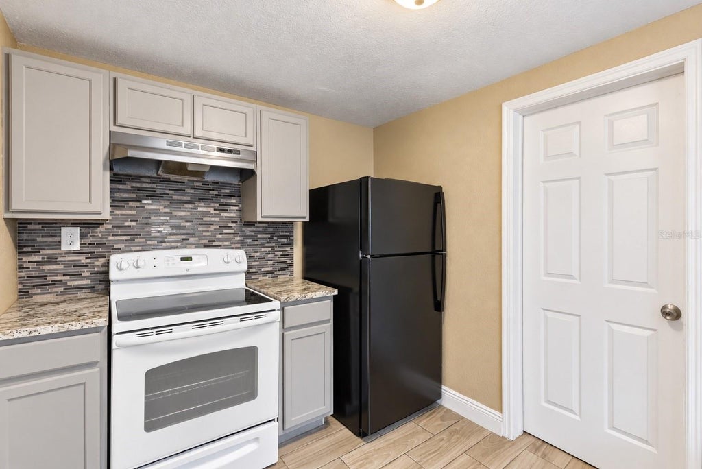 Photo of 1307 W Kaley Avenue, Orlando, FL 32805 (MLS # O6454017)