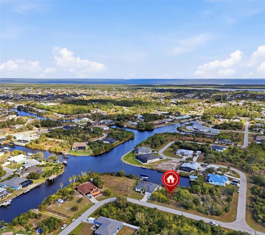***MOTIVATED SELLER***BRING ALL OFFERS***MUST SELL**Looking for the perfect piece of land to build your Florida dream home? This WATERFRONT homesite offers exceptional boating access with routes to the Gulf for deep-sea fishing, the Intracoastal Waterway for leisurely cruising, and Charlotte Harbor, renowned for waterfront dining and its diverse marine ecosystem as Florida’s second-largest estuary.

The property is conveniently served by public water and public sewer and is ideally located near pristine beaches and numerous championship golf courses. Situated within South Gulf Cove, a desirable community featuring two boat ramps across five neighborhood parks, this area offers the flexibility of an optional HOA along with architectural deed restrictions designed to preserve neighborhood quality and long-term value.

Bring all your toys—boat, RV, golf cart, kayaks—with ample room to add a detached garage, workshop, art studio, shed, or recreational features. There’s also plenty of space to design your own private pool, creating the ultimate Florida lifestyle retreat.

The surrounding neighborhood showcases attractive newer homes, with ongoing construction reflecting continued growth and demand. Enjoy close proximity to everyday amenities, as well as the sandy beaches and turquoise waters of Venice, Englewood, and Boca Grande. Golf courses, boat launches, and entertainment are all nearby, including minutes to the Tampa Bay Rays Spring Training Stadium, which hosts games against the Yankees, Red Sox, Braves, Mets, and more.

A local builder is available with customizable floor plans, including 3-bedroom, 2-bath homes featuring 10’ ceilings, 8’ interior doors, porcelain plank flooring throughout, quartz or granite countertops, impact windows, upgraded lighting and ceiling fans, and appliances. All-inclusive build pricing starting at $320,000.