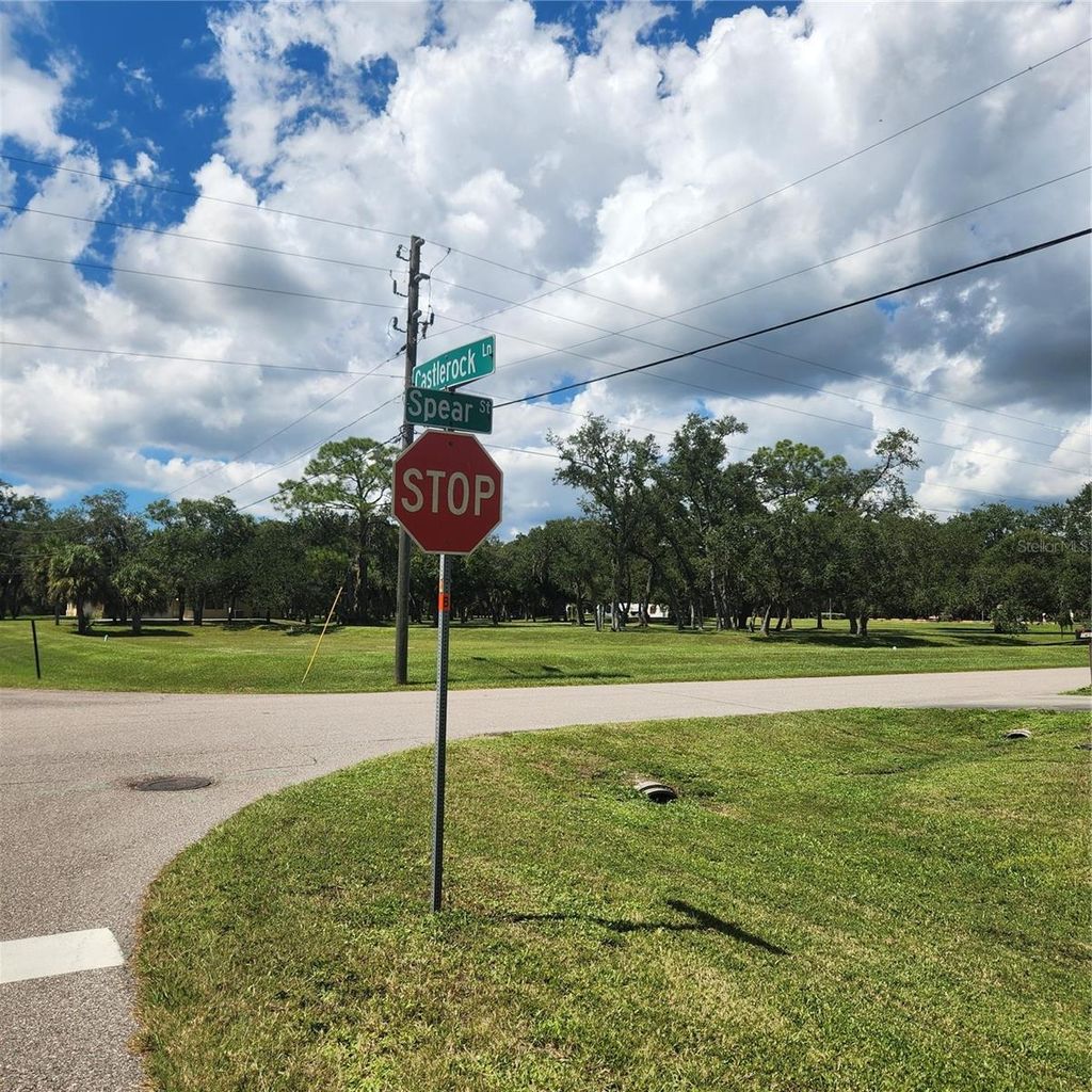 Photo of 1587 Castlerock Lane, Port Charlotte, FL 33948 (MLS # D6144307)