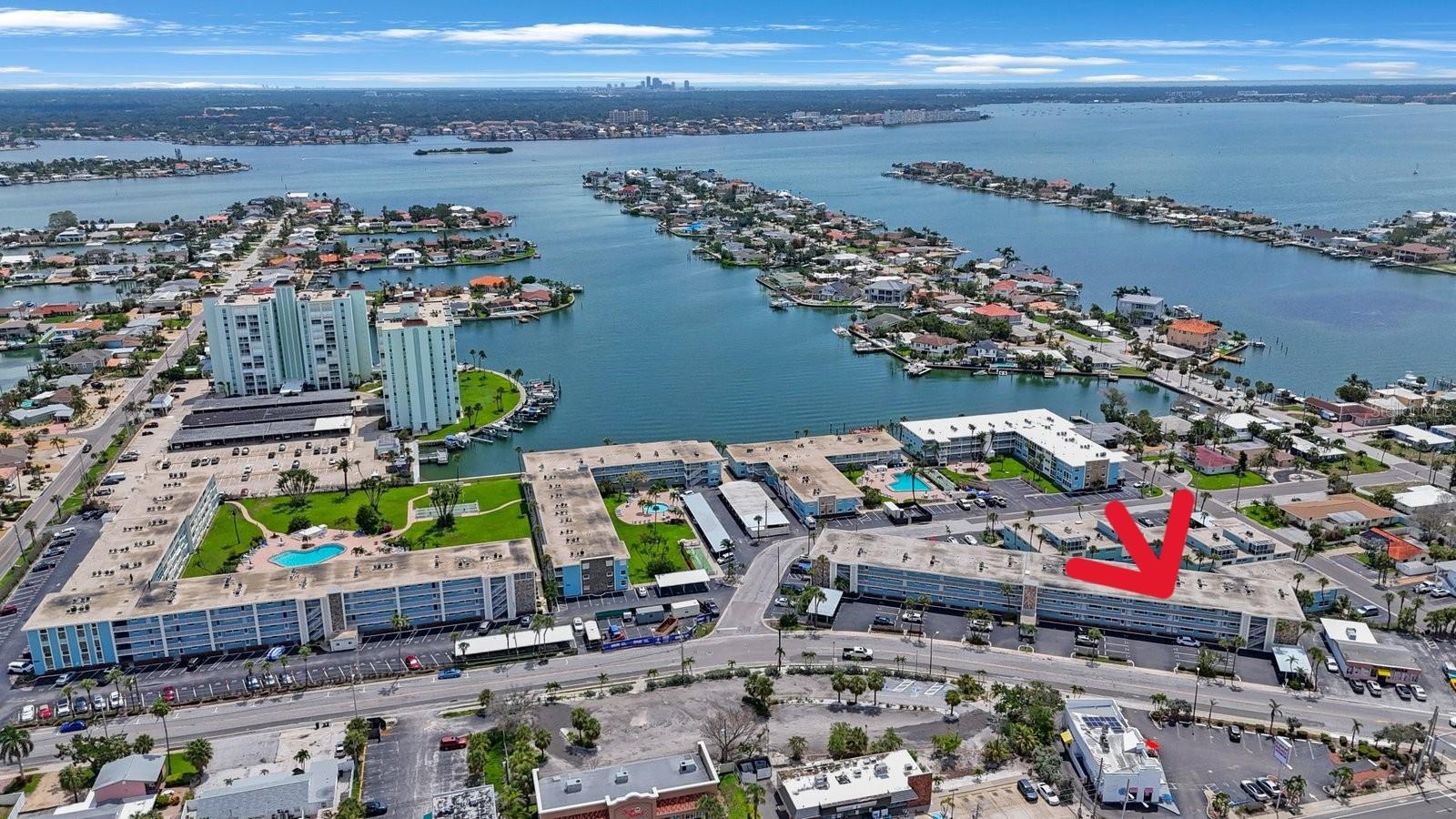 Welcome to your coastal retreat in the heart of St. Pete Beach! Delightful one bedroom, one bath third floor condo with partial Gulf views—a gentle reminder that you are just steps away from one of Florida’s renowned beaches. Step inside to discover gorgeous terrazzo floors that flow through the unit, adding timeless charm and easy maintenance. Storm windows and hurricane shutters provide peace of mind. The open living and dining area is filled with natural light and a cozy kitchen makes perfect use of the space with granite countertops and stainless steel appliances. The spacious bedroom boasts a 5’ x 8’ walk-in closet and the full bath is clean, bright and just right. Additional storage on 3rd floor by elevator is perfect for storing Beach chairs and floats.
Nestled in a well maintained community with two sparkling swimming pools, one of which is heated, this condo offers the perfect blend of relaxation and convenience. This vibrant community offers a private dock on the Intracoastal Waterway, tranquil landscaped patios for relaxing, and shuffleboard courts—ideal for enjoying the Florida lifestyle year-round.
Whether you are seeking a permanent slice of paradise, a seasonal escape or a future income producing rental (2 year ownership required prior to renting out for a three month minimum), this unit checks all the boxes. Located near local shops, restaurants, beach bars and entertainment, you’ll love the vibrant lifestyle that comes with living in St. Pete Beach. Enjoy the Fresh Market on Corey Avenue every Sunday. Beach access across the street through the Garden Hilton Hotel or at Upham Beach 5/10 of a mile away. Leave the car behind and take the Beach Trolley located nearby, call Freebee for a free ride to your local destination or take a day trip on the SunRunner to Downtown St. Petersburg and spend the day enjoying the Arts District, upscale dining, craft breweries, museums and the St. Pete Pier. St. Pete Beach Residents enjoy free parking at city parks which includes Upham Beach located 5/10 of a mile away or Pass-A-Grille Beach just a few miles south.
Be sure to take advantage of this rare opportunity to own a charming condo in one of Florida’s most desirable communities! Schedule your private tour today and start living the beach live you’ve been dreaming of!