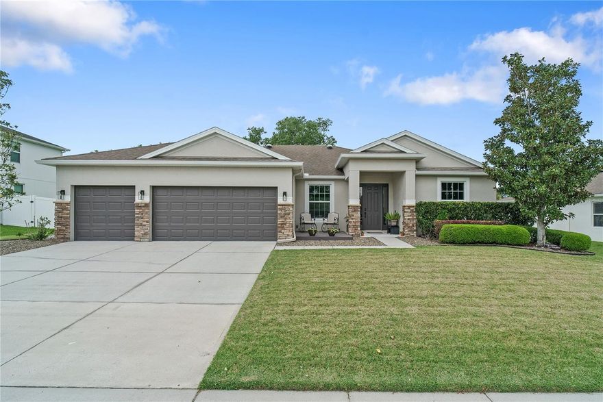 One or more photo(s) has been virtually staged. Welcome to the Downtown Winter Garden Golf Cart District where lifestyle and location just make sense.  This 4 bedroom, 2 bath pool home blends thoughtful upgrades with a layout that actually works for real life.  From the moment you walk in, the natural light and open flow stand out.  The main living spaces connect seamlessly, creating an easy, inviting feel whether you are hosting or just enjoying a night in.  Throughout the home you will notice custom woodworking details that add warmth and character.  From built ins to trim work, these touches elevate the space and give it a more intentional, finished look you do not see in every home.  The kitchen offers a clean, updated feel with modern finishes, refreshed cabinetry, and functional space that opens directly into the dining and living areas.  It is designed to be both practical and a place people naturally gather.  One of the biggest advantages of this home is the fully paid off whole home solar system paired with multiple battery backups.  This means lower monthly costs and added reliability during storms or outages, something that continues to matter more and more.  Step outside and you get your own private backyard setup.  The pool and spa create a true stay at home retreat.  Whether it is weekends with friends or a quiet evening, the space is set up to be enjoyed year round.  The three car garage is a rare find in this area and gives you all the room you need for a golf cart, bikes, storage or hobbies.  Living here is where this home really stands out.  Hop on your golf cart and head straight into downtown Winter Garden, one of the most loved small town districts in Central Florida.  You are minutes away from a nationally recognized farmers market, the Crooked Can Brewery, the splash pad, Plant Street Market and a full calendar of events throughout the year.  From live music and seasonal festivals to outdoor dining and boutique shopping, there is always something happening.  The entire area has that walkable, charming feel that makes it feel like a Hallmark town brought to life.  You are also close to Horizon West, major highways, top rated schools, downtown Orlando and the theme parks, giving you the perfect mix of convenience and small town charm.  Homes like this in this location do not come up often.  If you are looking for a home with character, smart upgrades, and a lifestyle that people move here for, this is it.
