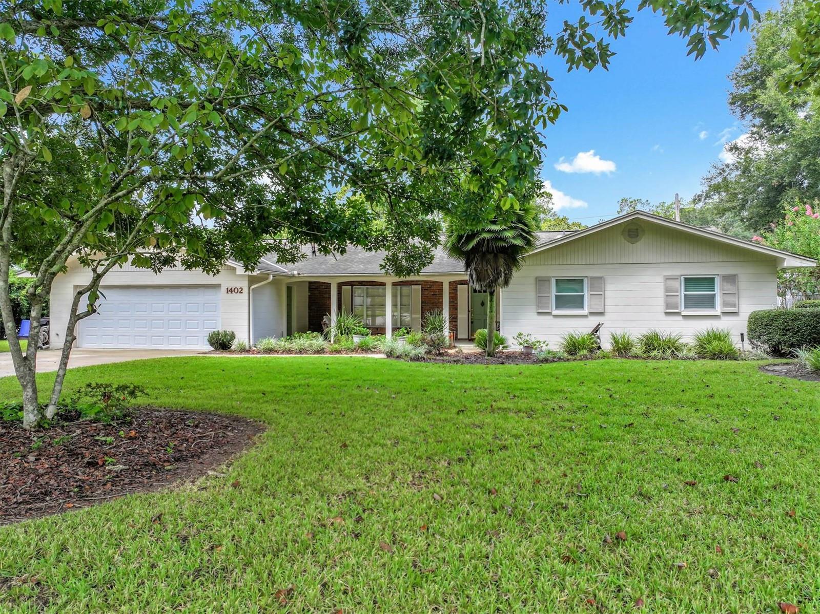 This beautifully maintained 4-bedroom, 3-bath single-story home is situated in the sought-after Ridgewood S/D Unit #2 subdivision of Gainesville. Set on a generous 15,805 sq ft lot, the property offers outstanding curb appeal with professionally landscaped grounds and mature trees, all located in a desirable neighborhood just minutes from shopping, parks, hospitals, UF, and scenic nature trails.
Step inside to discover a welcoming and functional floorplan highlighted by a formal L-shaped dining area, elegant French doors, abundant natural light from skylights, and a stylish wet bar for effortless entertaining. The spacious living areas are complemented by solid wood cabinets, ceiling fans, recently updated bathrooms, and thoughtfully designed window treatments throughout. Enjoy comfort year-round with central A/C, efficient electric heating, and a smart thermostat for convenience.
An additional in-law suite/bonus room under air with en-suite bathroom and wet bar provides flexible space to serve as a 5th bedroom, office, or extra living area—perfect for families needing more room to grow. The home’s interior also includes a convenient inside laundry area and an owned security system for peace of mind.
Retreat to one of four well-proportioned bedrooms, including a primary suite with a walk-in closet for extra storage and comfort plus a deep garden whirlpool tub for ultimate relaxation, along with two updated full bathrooms for family and guests. Allow easy indoor-outdoor living with French doors leading to an inviting backyard oasis—ideal for relaxing or entertaining—plus the benefits of a large lot on an asphalt, publicly maintained road.
Built in 1967 with timeless charm and modern updates, this home truly offers it all: style, functionality, and a wonderful community setting. Experience the perfect blend of privacy and proximity to everything Gainesville has to offer. Schedule your tour today and see how this exceptional property could become your new home!
