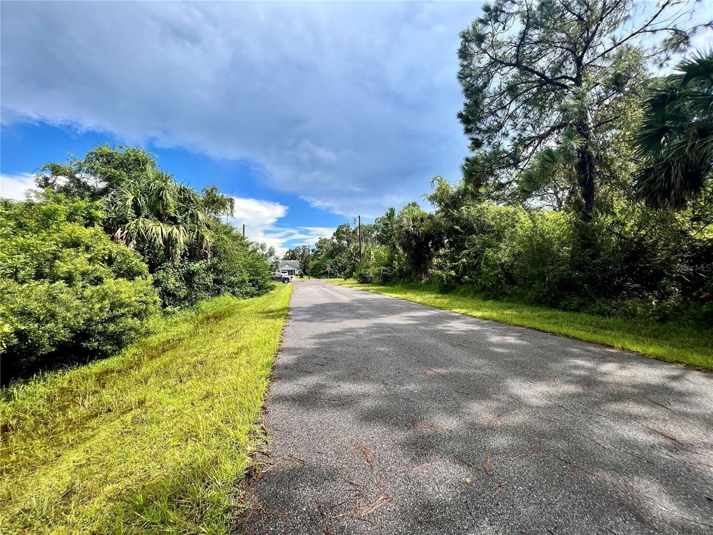 Photo of 420 Bonsell Lane, Port Charlotte, FL 33953 (MLS # C7500408)