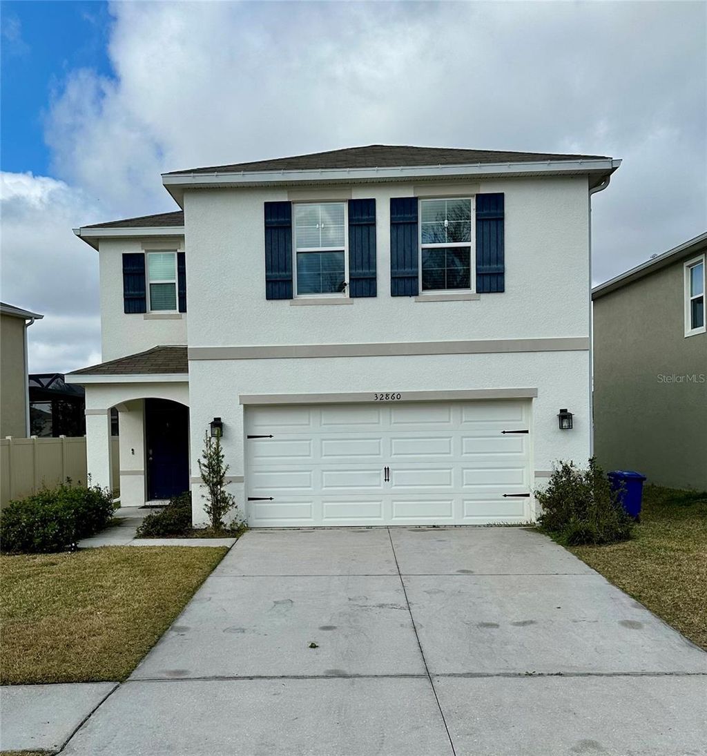 Photo of 32860 Brooks Hawk Lane, Wesley Chapel, FL 33543 (MLS # TB8463374)