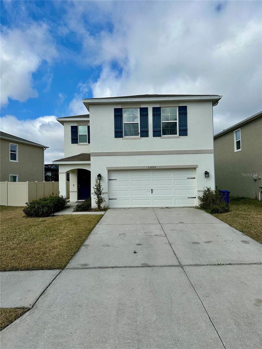 Welcome to this stunning home in the highly desirable, Union Park in the Meadow Pointe III community! This elegant 2260sq/ft residence offers two stories of spacious living area. This floorplan has a large master suite with a walk-in closet and a private ensuite bathroom. This home has a beautiful, spacious kitchen that opens out to the dining room/living room combination that creates an open and welcoming space for entertaining. Wait until you see your new kitchen which features granite countertops, stainless steel appliances, a pantry with ample cabinet space, and barstool seating, making it perfect for casual dining or chatting it up with some friends. Sliding glass doors lead from the living area to your back patio, providing a peaceful retreat. Upstairs, you'll find generously sized bedrooms, and a guest bathroom. For ultimate convenience, the washer and dryer are also located on the second floor. Resort-Style Amenities Include: access to the pool, clubhouse, fitness center, basketball courts, and a playground—everything you need for an active lifestyle! Prime Wesley Chapel Location! Located just minutes from The Shops at Wiregrass, Tampa Premium Outlets, top-rated schools, dining, and entertainment, with easy access to I-75 for a quick commute to Tampa. Don’t miss out on this incredible opportunity—schedule your showing today!The CONVENIENT LOCATION to the WIREGRASS Shopping Center, the TAMPA OUTLETS, and multiple grocery stores make daily life a little simpler, while the home’s proximity to I-75 leading into TAMPA makes experiencing the city only minutes away. Schedule your private tour today and fall in love with your next home!