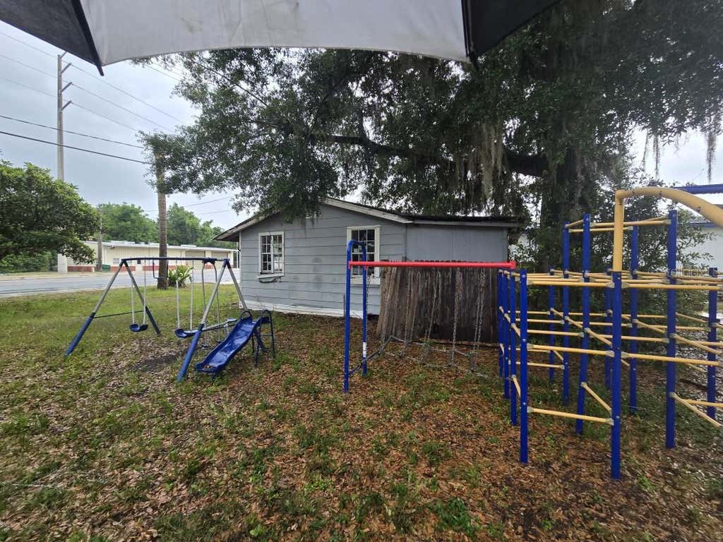 Photo of 515 Ronald Reagan Parkway, Davenport, FL 33896 (MLS # A4697344)