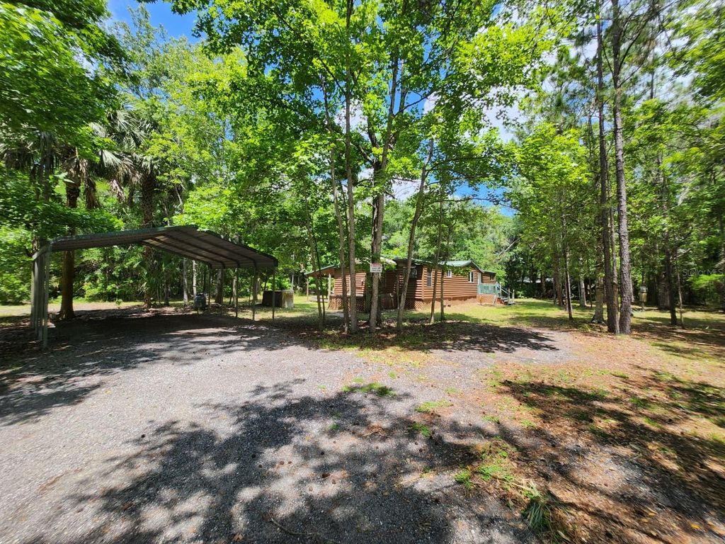Photo of 1450 Almond Street, Bunnell, FL 32110 (MLS # O6404657)