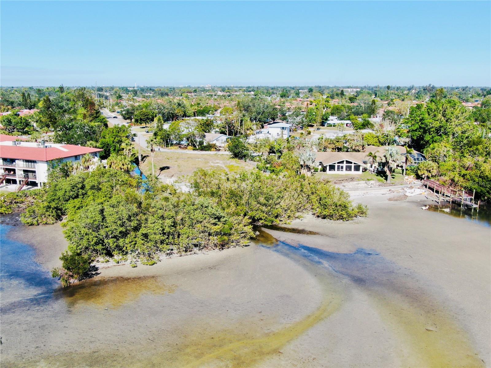 Unparalleled Waterfront Opportunity – Endless Potential!
Seize the chance to create your dream luxury estate on a spectacular waterfront property with breathtaking panoramic views of Sarasota Bay! Enjoy the dazzling downtown Sarasota skyline and the tranquil beauty of Longboat Key, all from your own private oasis.
This rare, nearly half-acre parcel boasts 120 feet of pristine bay frontage, offering an unrivaled setting for your custom-built masterpiece. But the possibilities don’t stop there!
Unlock Investment Potential – Manatee County currently has no rental restrictions, making this a prime opportunity for a high-end rental or vacation retreat.
Build More, Dream Bigger – Explore the potential to re-plat the lot and create two luxury homes or design an auxiliary dwelling unit (ADU) for guests, family, or additional income.
World-Class Location – Just 3 Minutes from the world famous IMG Academy, elite golf and tennis venues, and Sarasota’s finest dining, arts, and entertainment.
With a cleared lot, ready for new construction, this is more than just a property—it’s an invitation to embrace the ultimate coastal lifestyle.
Opportunities like this are rare—don’t miss your chance to build your vision on the bay!
All information should be independently verified with the county and municipalities to confirm development potential and any regulations.