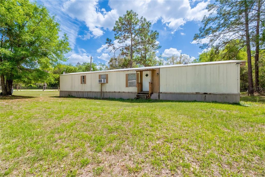 Photo of 8589 SE 66th Avenue, Trenton, FL 32693 (MLS # GC540022)