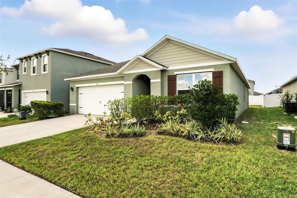 Photo of 1126 Tupelo Trail, Haines City, FL 33844 (MLS # O6350738)