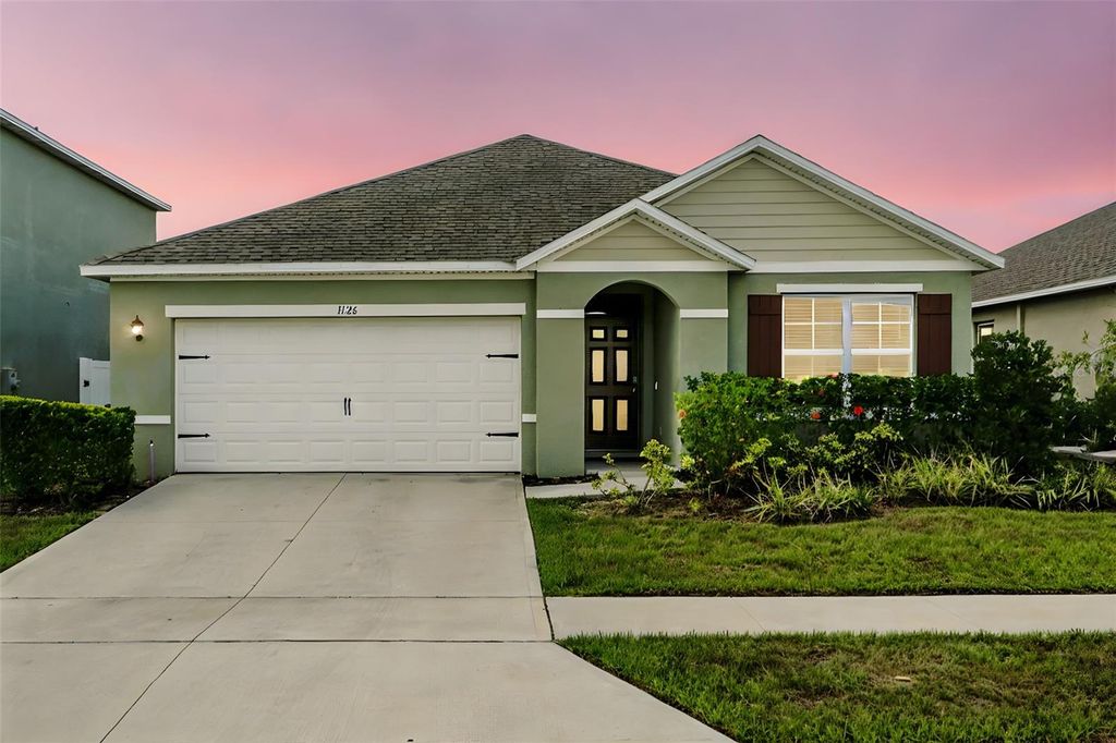 Photo of 1126 Tupelo Trail, Haines City, FL 33844 (MLS # O6350738)