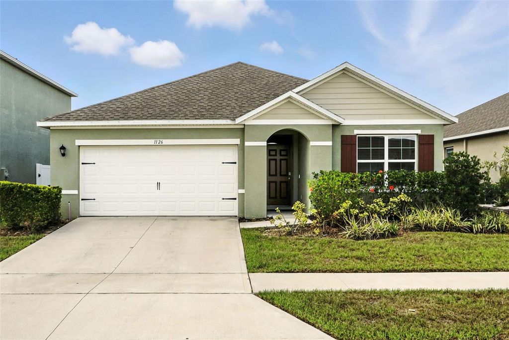 Photo of 1126 Tupelo Trail, Haines City, FL 33844 (MLS # O6350738)