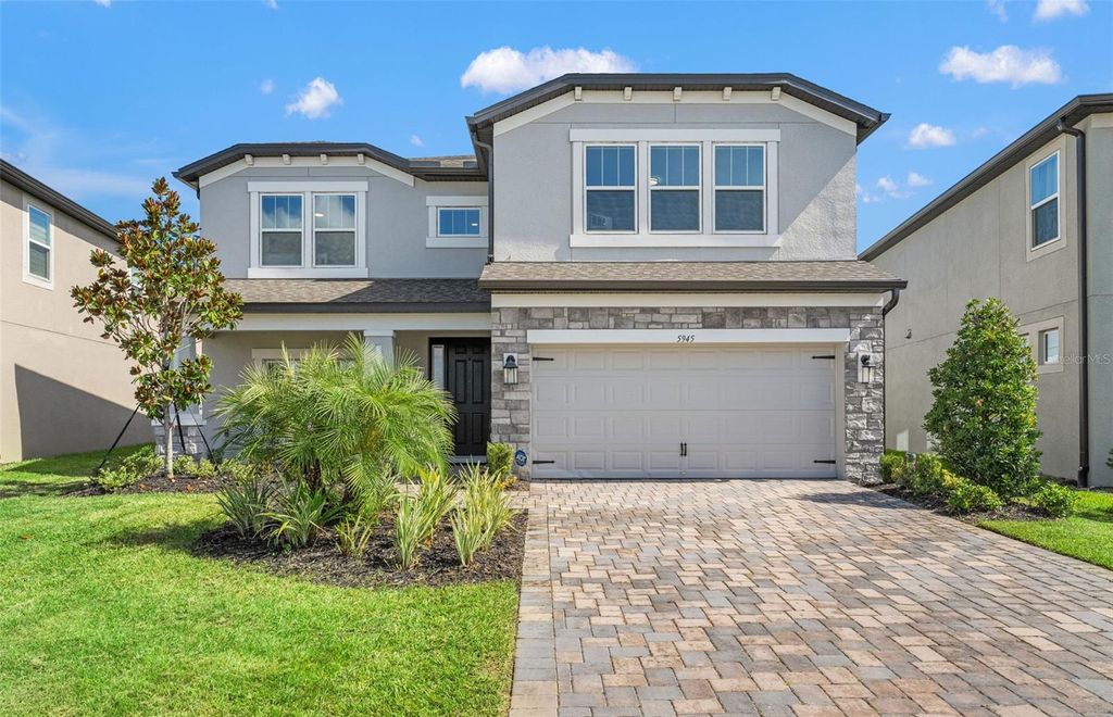 Photo of 5945 Newberry Pines Avenue, Wesley Chapel, FL 33545 (MLS # TB8429442)