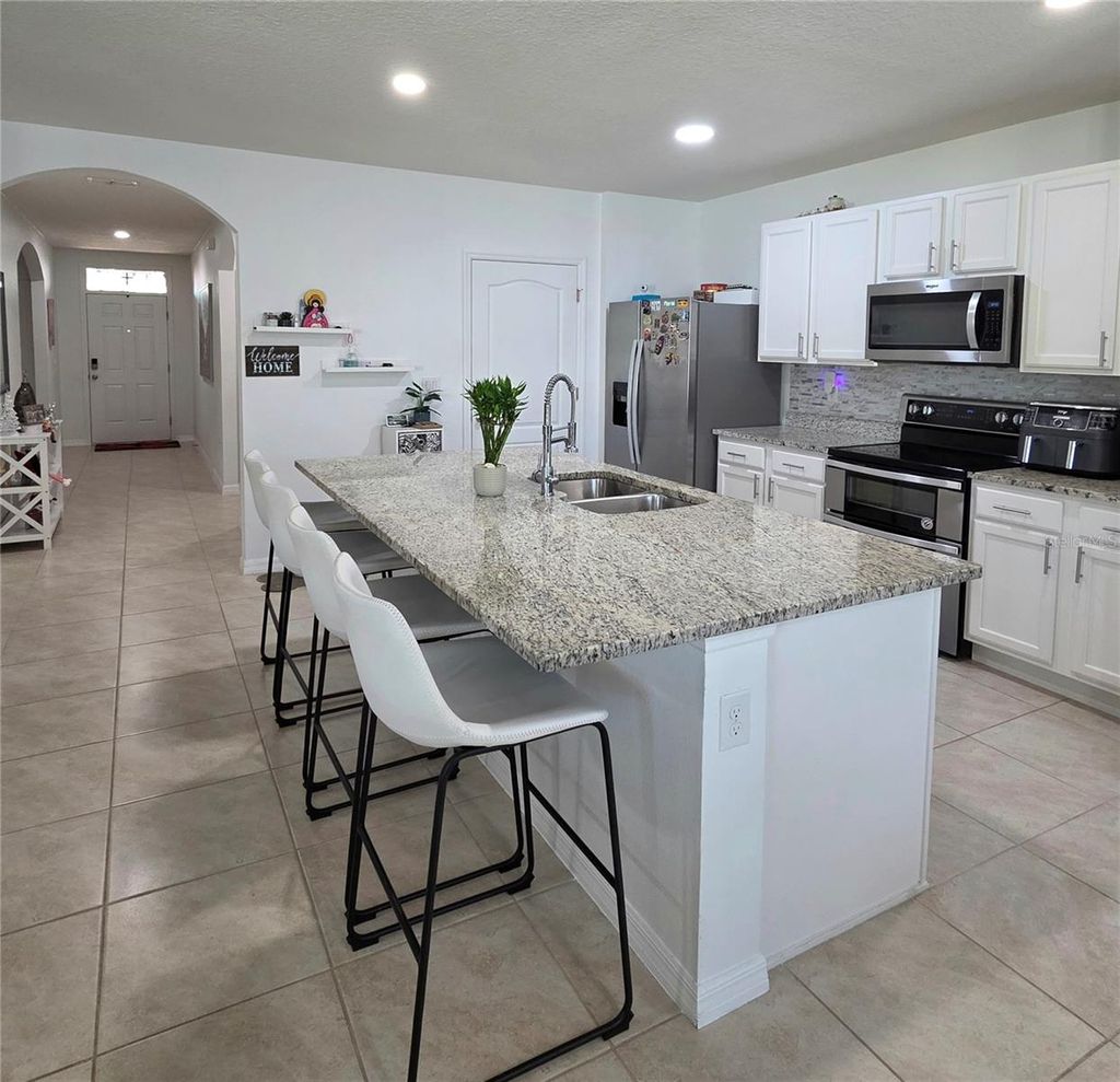 Photo of 1680 Spray Terrace, Saint Cloud, FL 34771 (MLS # O6364280)
