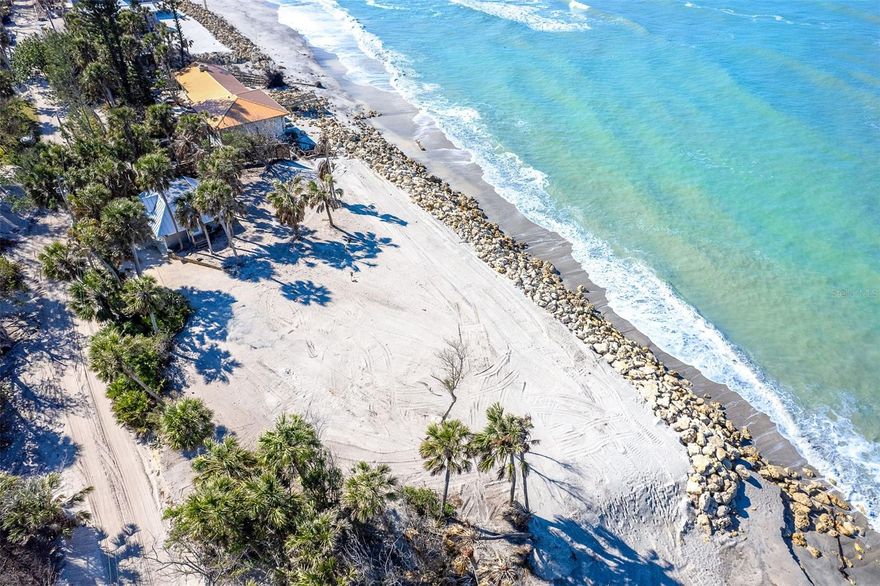 Significant Price Improvement of $250,000.  The seller is motivated to close quickly.  Don't miss this exceptional Opportunity. Serene Gulf-to-Bay property, where Old Florida charm meets modern luxury. This is a rare chance to build your dream home on one of the Islands most coveted neighborhoods in a serene and private setting where you can enjoy nature with tropical birds, dolphins and endless Sunsets. Nestled on the exclusive north end of Manasota Key, this private, gated retreat is perfectly positioned between Sarasota and Naples.
Spanning 1.2 acres with an impressive 180 feet of pristine Gulf frontage, this rare offering includes a private boat dock and lift on the Intracoastal Waterway—ideal for those who love life on the water. The property has been meticulously prepared for your dream home, elevated and perched high above the ocean with a restored rock revetment ensuring peace of mind and a cleared homesite ready for construction. A two-car garage is already in place, adding convenience to this unparalleled setting.
Don’t miss this rare chance to create your coastal sanctuary in one of the island’s most sought-after locations. Paradise is truly within reach!