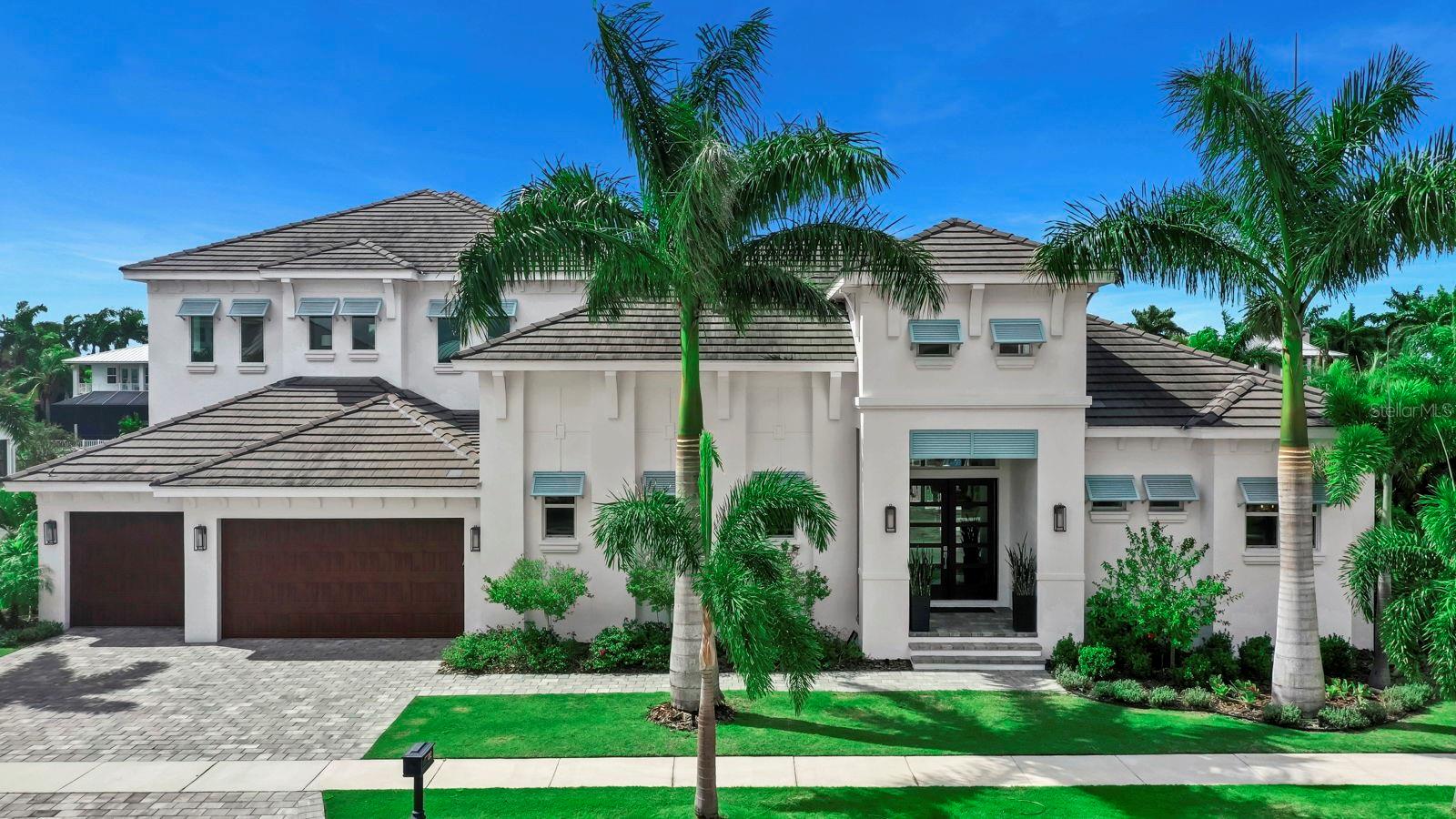 Luxury Coastal Waterfront Estate with Private Dock & Outdoor Oasis. Welcome to this exceptional 4-bedroom, 4-bathroom waterfront estate in a prestigious gated community offering direct access to the open waters of Tampa Bay.
Built in 2020 with no detail overlooked, this home blends modern elegance with relaxed coastal living, creating the perfect sanctuary for those who love both luxury and the water. Boating enthusiasts will appreciate the private dock with a 13,000 lb boat lift, providing quick and easy access to the Bay. The outdoor living space is a true showstopper, featuring a resort-style saltwater pool and spa, a fully equipped outdoor kitchen, covered lounge with fireplace, and premium turf grass for low-maintenance beauty.
Inside, the open-concept layout showcases high-end finishes throughout, including wood flooring, porcelain tile, and luxury carpet. The gourmet kitchen is the heart of the home, complete with an oversized island, quartz countertops, walk-in pantry, top-of-the-line appliances, and custom lighting and cabinetry.
The main-floor primary suite offers a private retreat with a spa-inspired bathroom and dual custom walk-in closets. A dedicated home office provides ideal work-from-home functionality, while the upstairs bonus room offers flexible space for a media room, gym, or playroom.
Upstairs, two generously sized ensuite bedrooms each feature full private baths and share access to a waterfront balcony, perfect for enjoying peaceful sunsets.
Additional highlights include custom ceilings and window treatments, a 3-car garage, and thoughtfully designed indoor and outdoor living spaces that make this home ideal for entertaining and everyday living.
This is more than a home - it's a lifestyle of waterfront luxury, modern design, and effortless elegance.