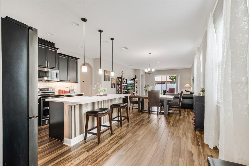 Photo of 12278 Northover Loop, Orlando, FL 32824 (MLS # O6419416)