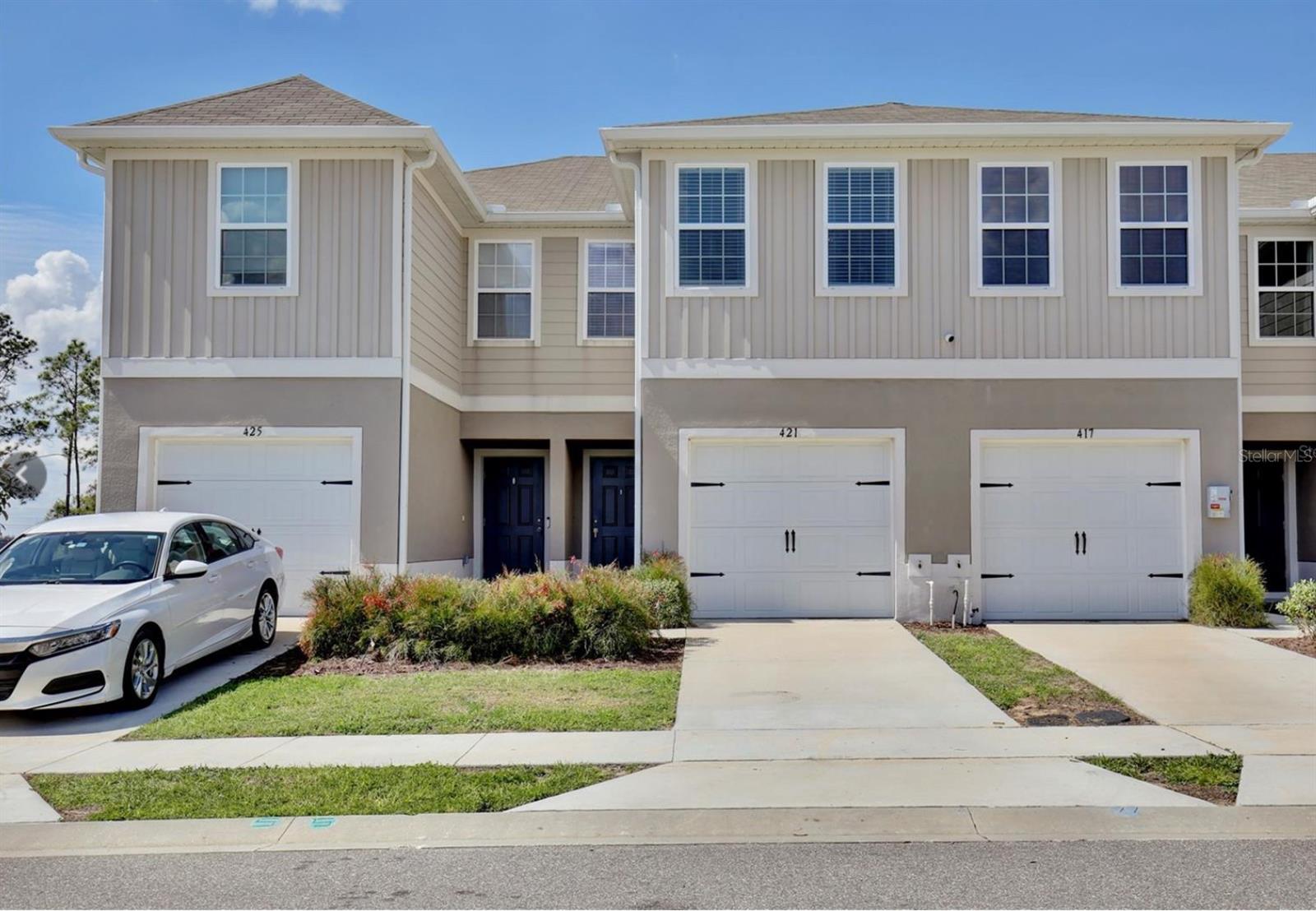 FOR RENT!!! Available NOW- Moving Ready!! Spacious 3-Bedroom 2.5 Bathroom Townhome in Magnolia Grove.
Welcome to this beautiful and modern townhouse located in the desirable Magnolia Grove community. Offering the perfect blend of comfort, style, and convenience, this home is ideal for anyone seeking a low-maintenance lifestyle close to everything Central Florida has to offer.
Inside, you'll find a light-filled open floor plan with neutral tones, tile flooring, and a one-car garage. The modern kitchen comes equipped with stainless steel appliances, granite countertops, shaker cabinets, and a center island with bar seating—ideal for both cooking and entertaining. A convenient half bath is located downstairs for guests.
The living room flows effortlessly onto an enclosed patio, perfect for relaxing mornings or casual weekend gatherings. Upstairs, enjoy a spacious primary suite featuring a walk-in closet and an en suite bathroom with dual vanities and a tiled shower. Two additional bedrooms share a full bathroom with a tub/shower combo.
Step outside to a fenced backyard with views of a serene grassy area and tall trees, offering a peaceful retreat.
Located just minutes from Highway 27 and I-4, this home offers quick access to Posner Mall, Cine Polis Theater, Walt Disney World, Legoland, AdventHealth, Publix, Target, HomeGoods and a wide range of dining and shopping options. Book your Appointment Today.