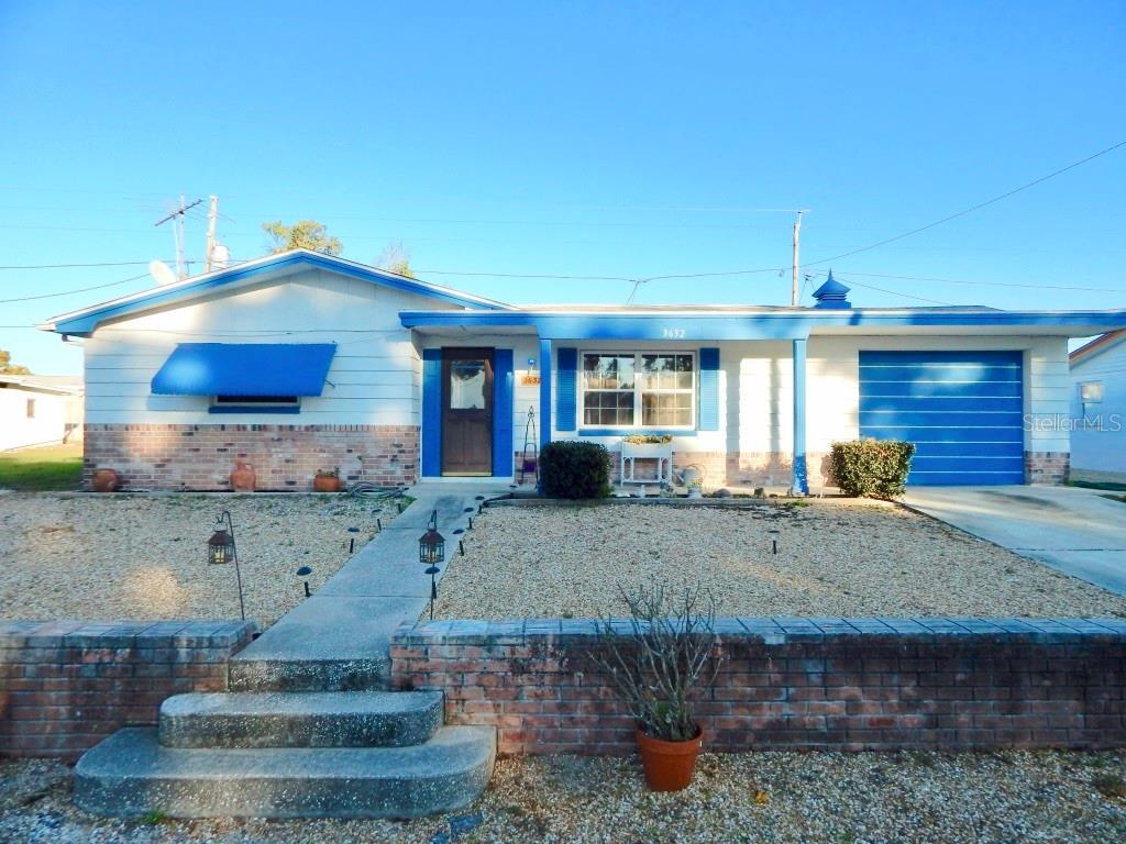 HIGH AND DRY POOL HOME WITH 2 BEDROOMS (1) FULL AND (2) 1/2 BATHS AND HUGE 1 CAR GARAGE . TILE THROUGHOUT ALL ROOMS, NEWER NEUTRAL PAINT, , EAT IN KITCHEN, NICE CURB APPEAL AND NEIGHBORS KEEP HOMES NICE. 12X24 IN GROUND POOL , FENCED YARD . AVAILABLE NOW