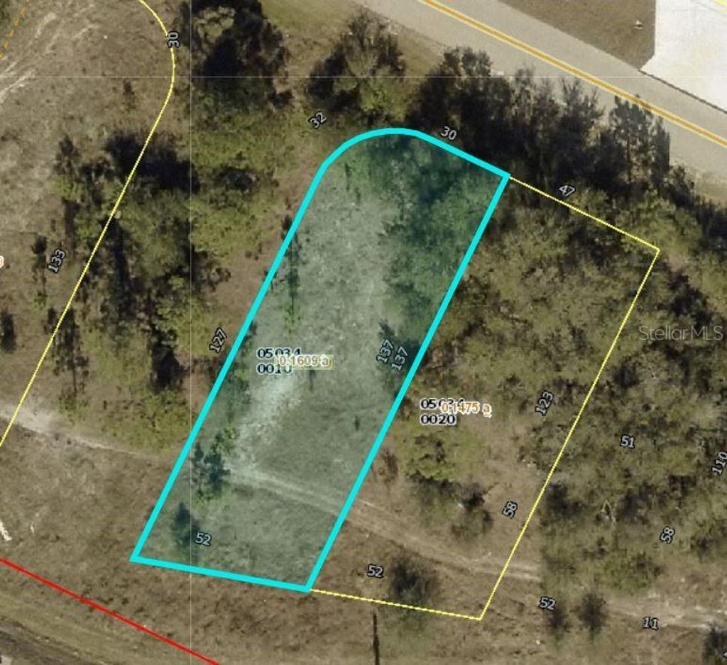 Photo of 1100 Meadow Road, Lehigh Acres, FL 33973 (MLS # C7525662)