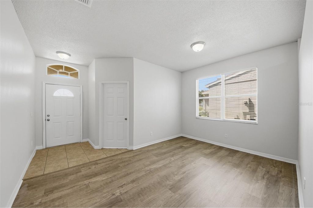 Photo of 949 Whispering Cypress Lane, Orlando, FL 32824 (MLS # O6404431)