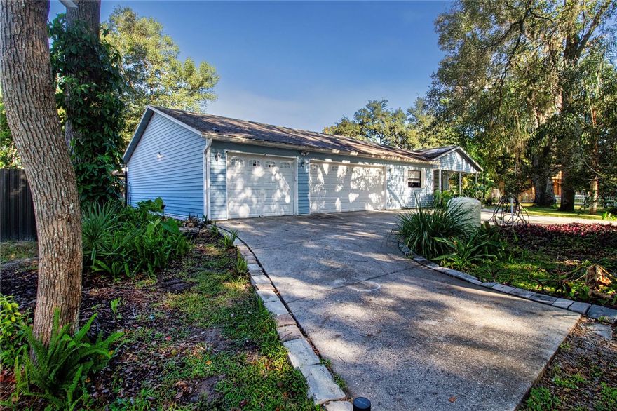 Presenting a charming residence featuring three bedrooms, two bathrooms, and a six-car garage situated on nearly half an acre. The spacious floor plan includes a kitchen and dining room combination that overlooks the living area, providing an open and inviting atmosphere. A generously sized bonus room with private entry offers flexibility for guest accommodations or a game room. The covered and screened back porch opens to a beautifully landscaped garden courtyard complete with gazebo. Additionally, the property includes an open pole barn for ample extra storage. The six-car tandem garage is ideally suited for automotive work or storage of recreational vehicles, boats, and other equipment.
Are you a first-time home buyer? This property is situated within an eligible USDA area, allowing for the possibility of zero down payment at purchase.
If you are seeking an income-generating opportunity, there are no rental restrictions associated with this property. It is well suited for use as an Airbnb or Vrbo. Conveniently located just 20 minutes from Weeki Wachee Springs and nearby boat launches. Close to shopping, schools and interstate. Schedule tour private showing today!