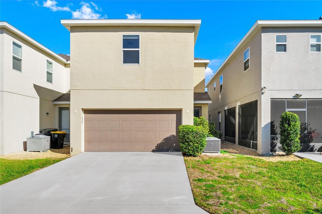 Photo of 258 Bella Prestwick Boulevard, Davenport, FL 33837 (MLS # O6378746)