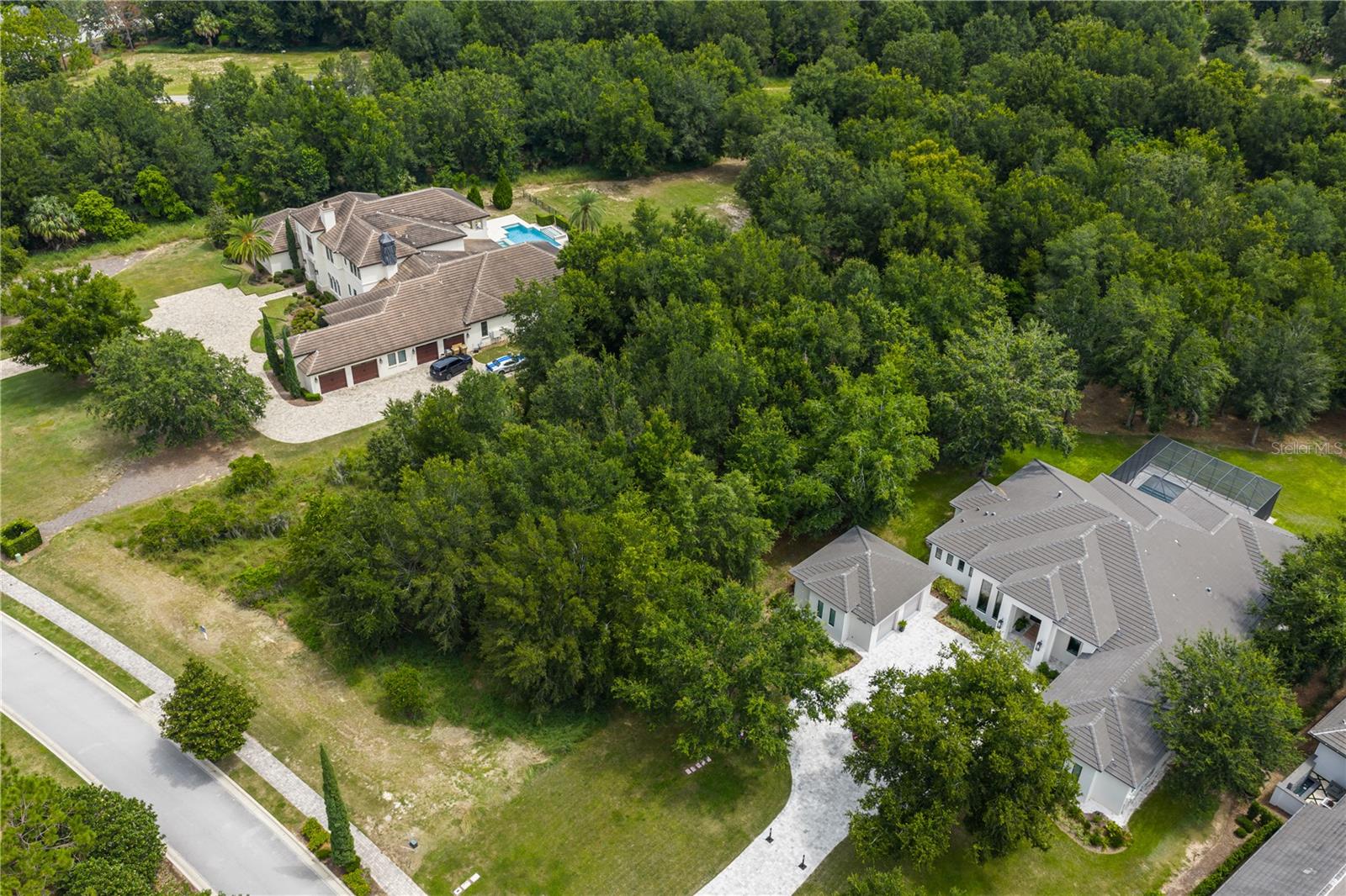 Nestled within the exclusive guard-gated community of Bella Collina, this 1.27-acre wooded homesite offers exceptional privacy on a serene one-way street. A perfect setting for outdoor living, this spacious lot provides ample room to design your dream backyard oasis—ideal for entertaining and family gatherings.
With a selection of seven premier custom builders, you have the flexibility to create a fully custom home or personalize an existing floor plan to match your vision. Conveniently located near the Florida Turnpike, 408, and 429 highways, Bella Collina offers easy access to Central Florida’s top destinations. Enjoy the charm of downtown Winter Garden, the scenic West Orange bike trails, and proximity to Montverde Academy, just 1.5 miles away.
This sought-after community offers an extraordinary lifestyle, featuring an 18-hole Nick Faldo-designed championship golf course, year-round culinary and social events, two fine dining restaurants, tennis and pickleball courts, a luxury spa, a resort-style pool complex, and a state-of-the-art fitness center with 20 complimentary fitness classes each week. Plus, the developer is deferring the $40,000 Sports Membership fee to the buyer at closing.
Don't miss this opportunity—call today to schedule a tour of this homesite and explore the lifestyle that Bella Collina provides!