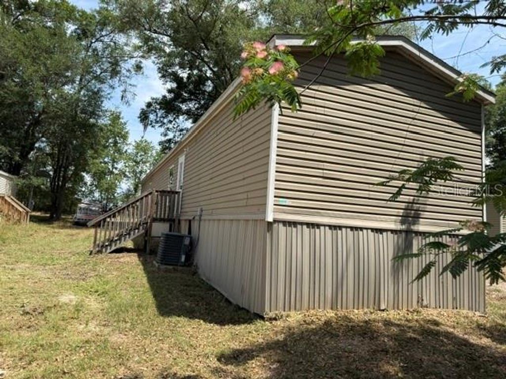 Photo of 21420 NE 41st Street, Williston, FL 32696 (MLS # GC540039)