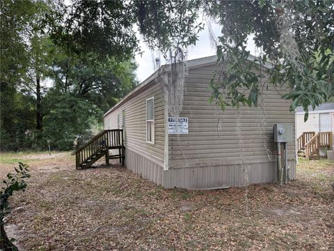 Photo of 21420 NE 41st Street, Williston, FL 32696 (MLS # GC540039)