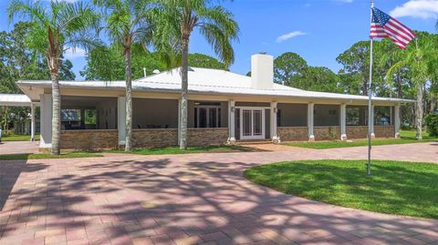 Photo of 2659 Pioneer Trail, New Smyrna Beach, FL 32168 (MLS # O6326077)