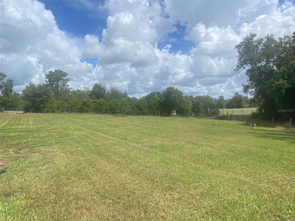 Photo of 8350 E Derby Oaks Drive, Floral City, FL 34436 (MLS # TB8487135)