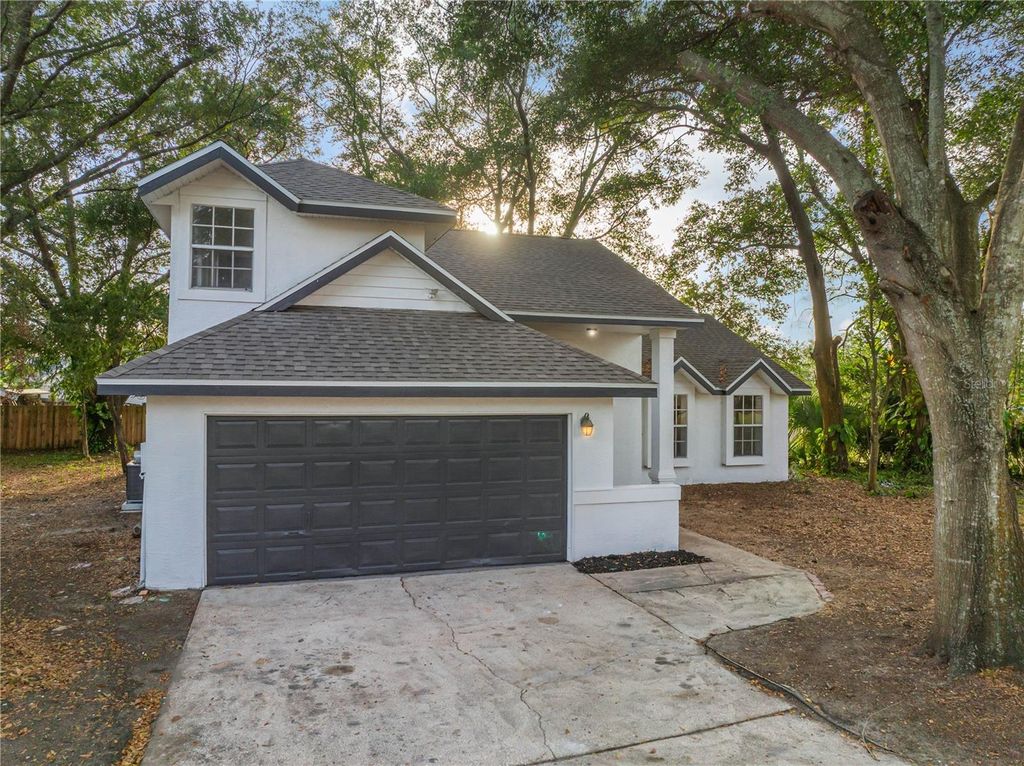 Photo of 6830 Merganser Drive, Orlando, FL 32810 (MLS # S5141621)